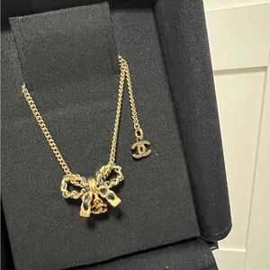 Chanel Gold Necklace with Bow and Charm